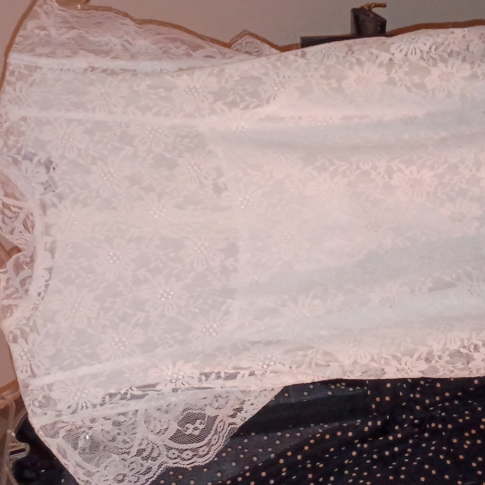 A lace dress , wear for beach or party wedding